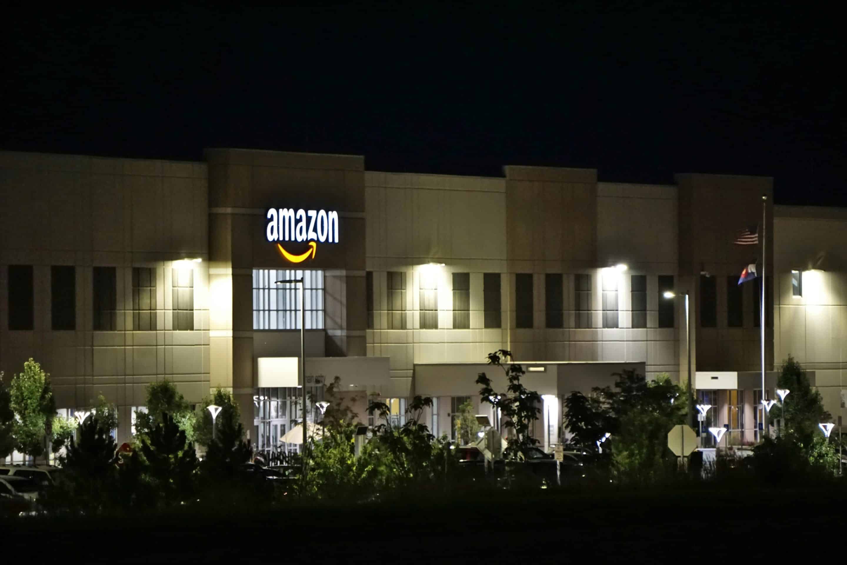 amazon-concrete-building-during-night-time