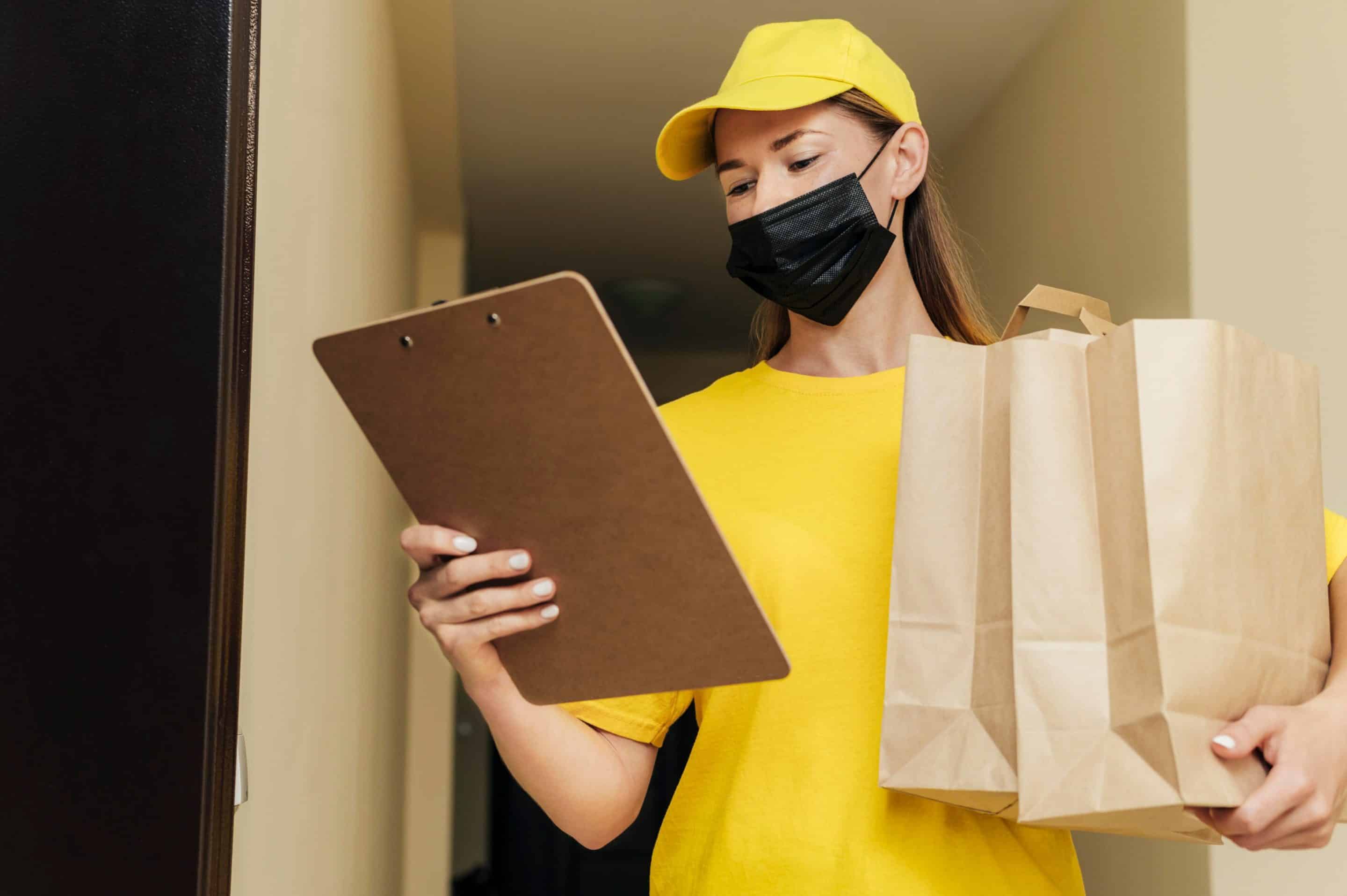 medium-shot-woman-holding-clipboard